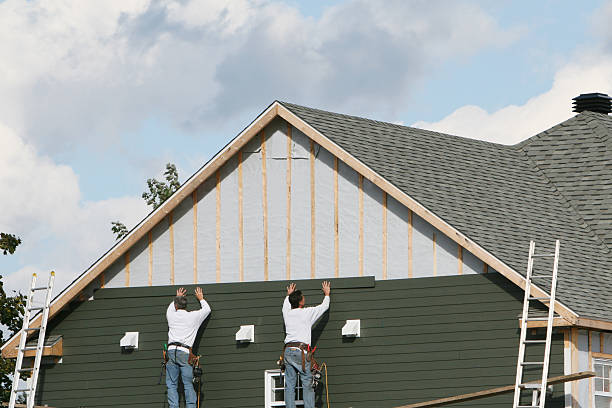 Professional Siding Replacement technician working in Bailey, NC